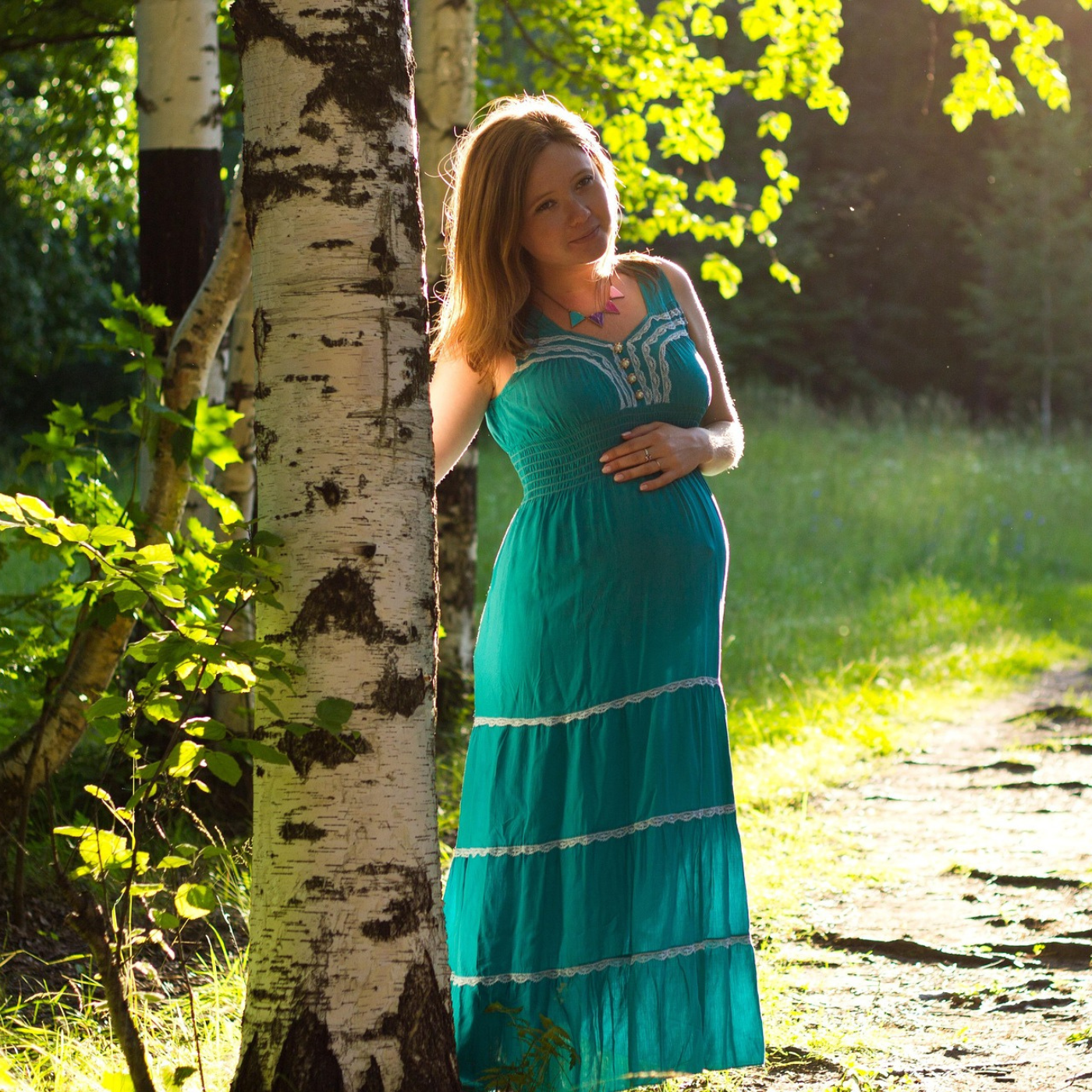 pregnant woman in woodland